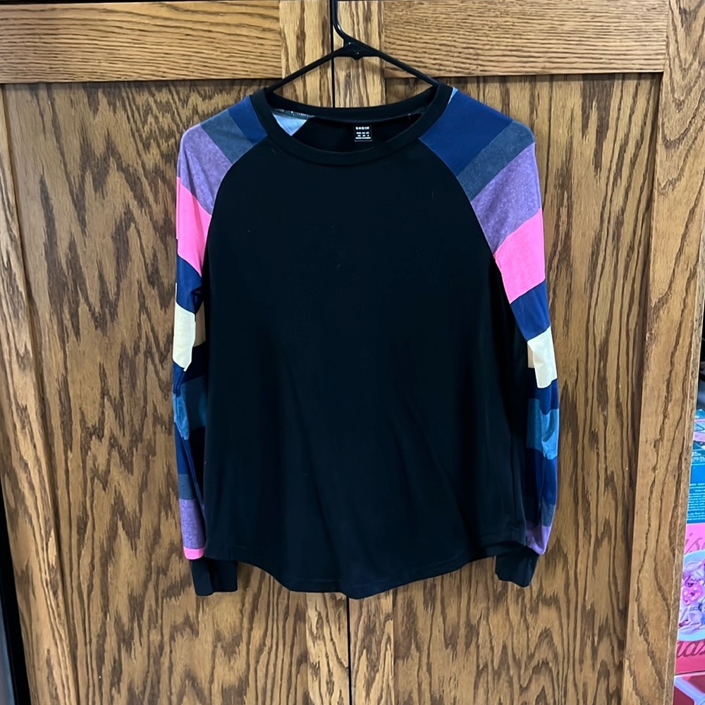 Womens XS black with stripped long sleeves. Does like a small